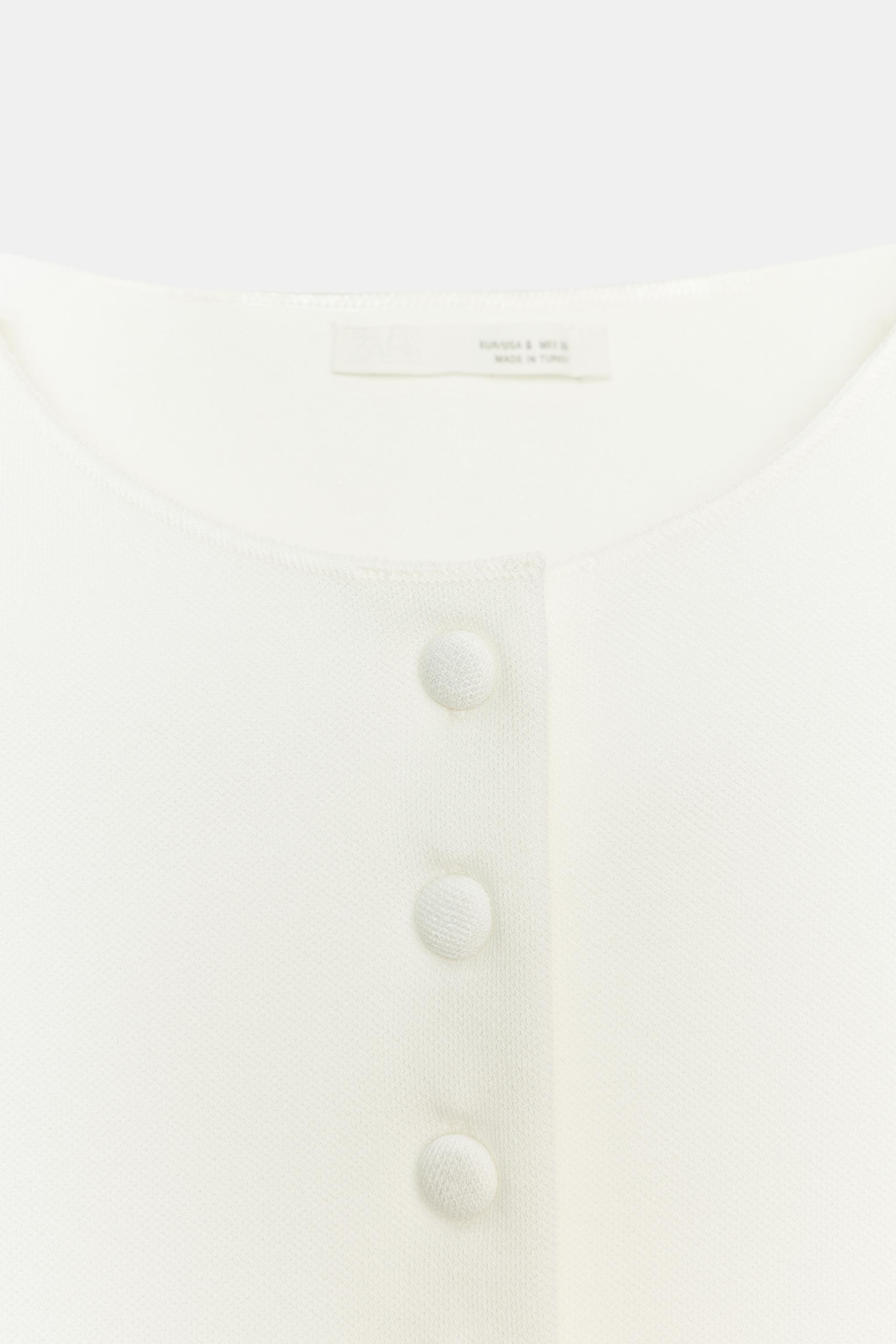 BUTTONED VEST TOP